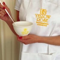 Priekšauts ar Yellow Rose logo